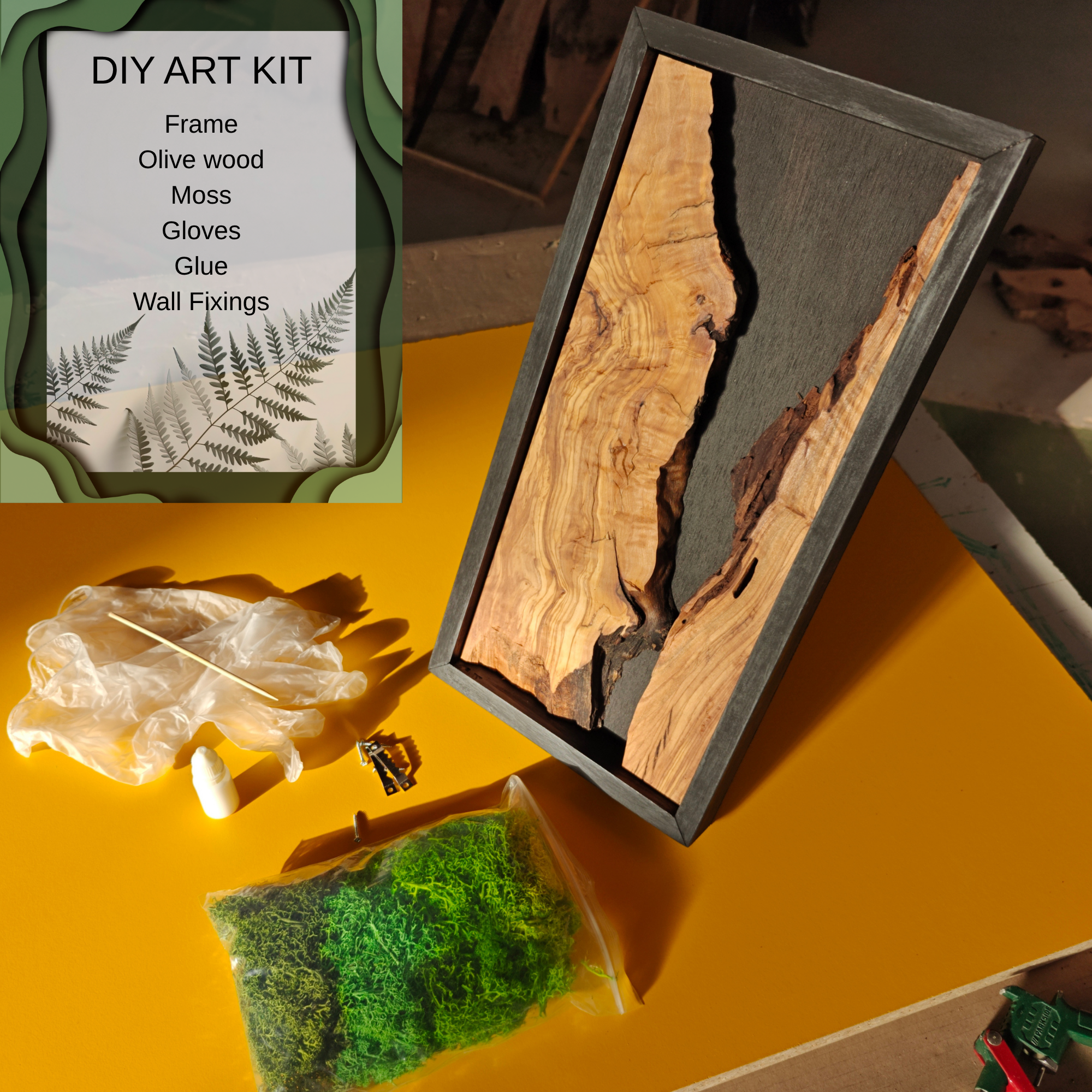 DIY art kit with olive wood, moss, gloves, glue, and wall fixings on a yellow surface.